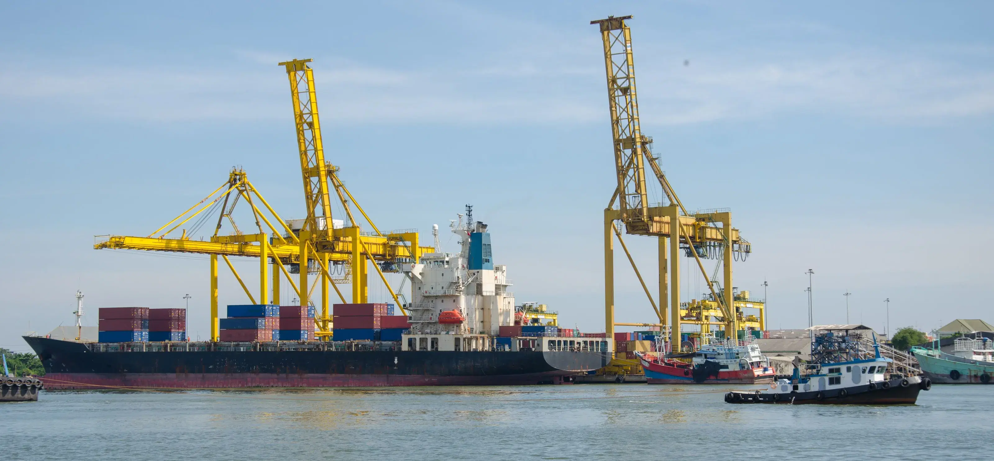 Cranes working a vessel at the quay